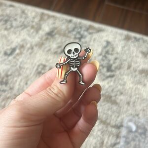 Dancing skeleton enamel pin